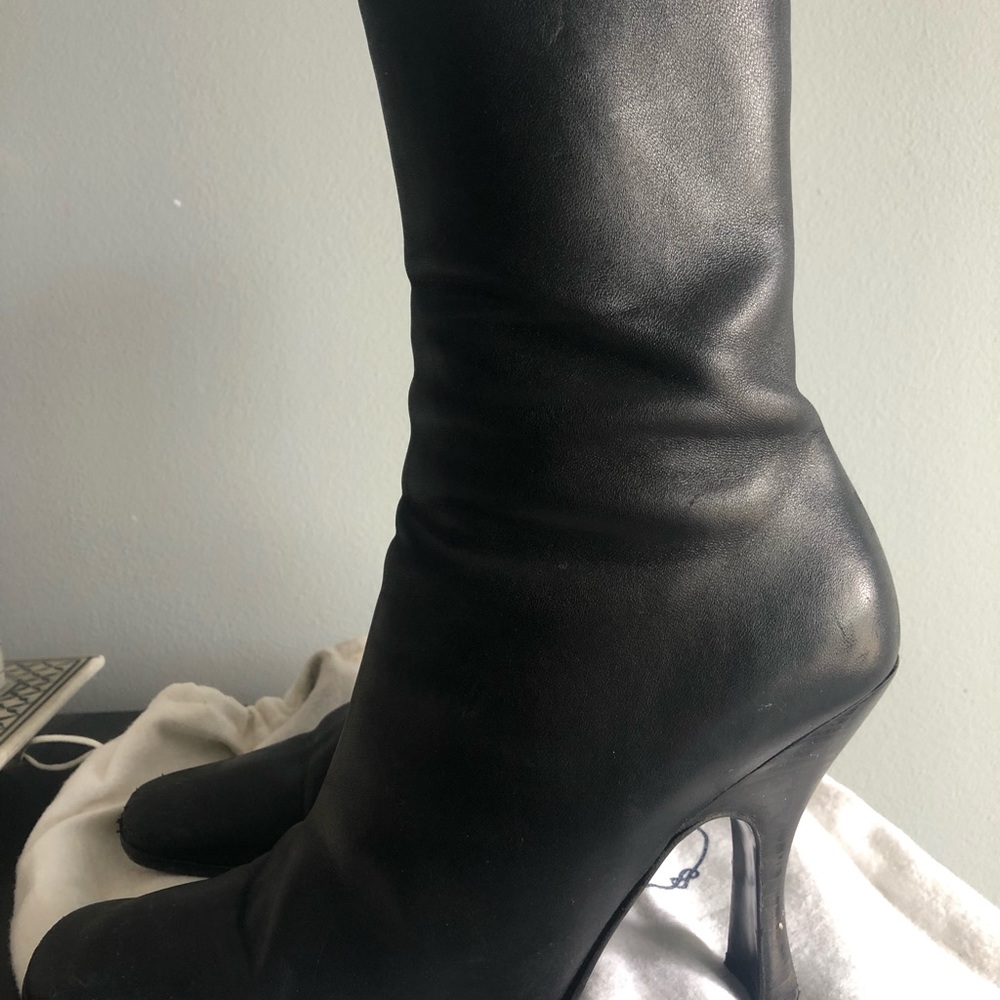 Vintage black Prada high heeled boots, mid-calf length.